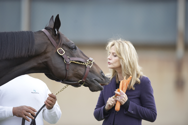Zenyatta with woman.